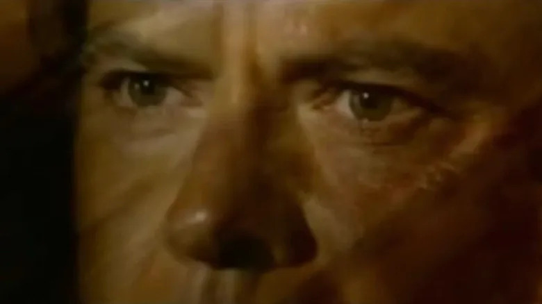 Robert Urich's James Cathcart is seen in extreme closeup during the title sequence for The Lazarus Man