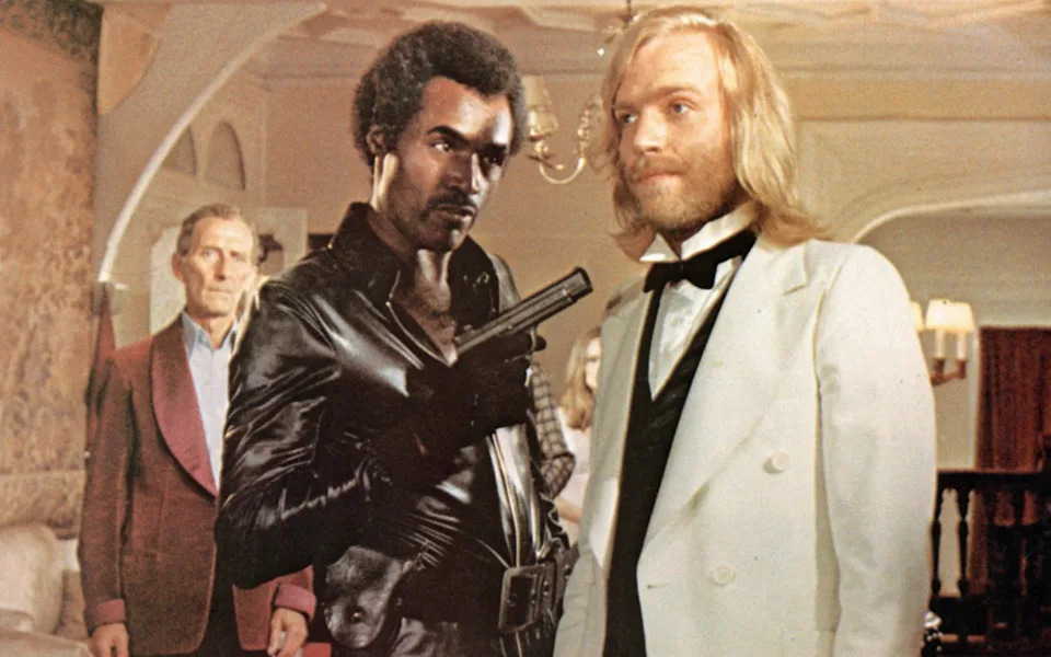 Chadbon, right, with Peter Cushing and Calvin Lockhart in the 1974 film The Beast Must Die