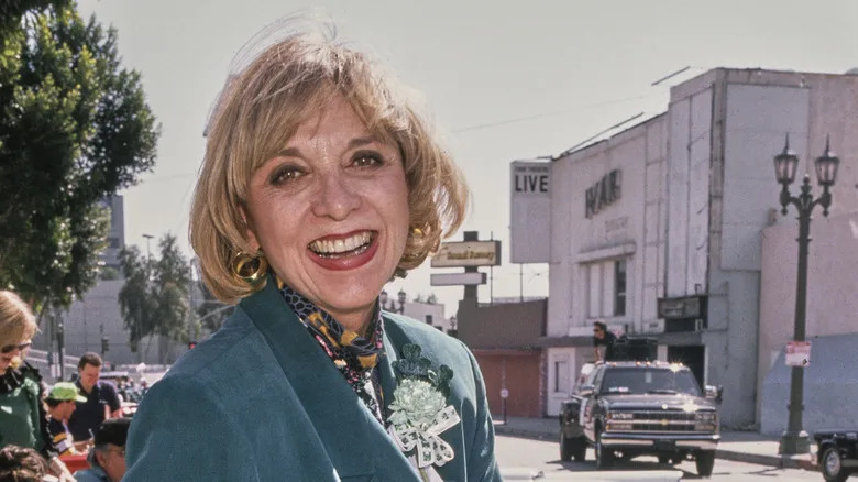 Beverly Garland standing outside on a street in Hollywood