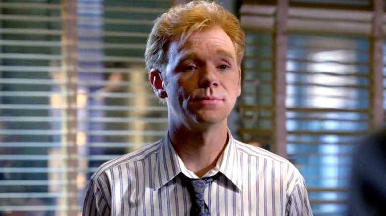 David Caruso wearing a white striped shirt and a blue tie on "NYPD Blue"