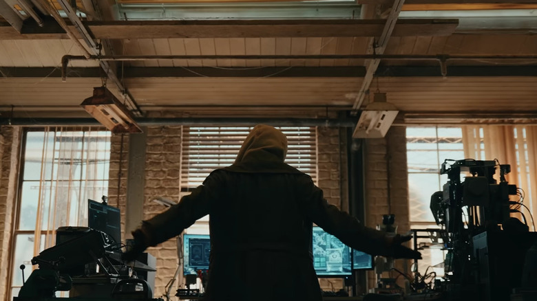 Jean Grey wearing a hoodie and standing in front of computer equipment in Spider-Man: Brand New Day