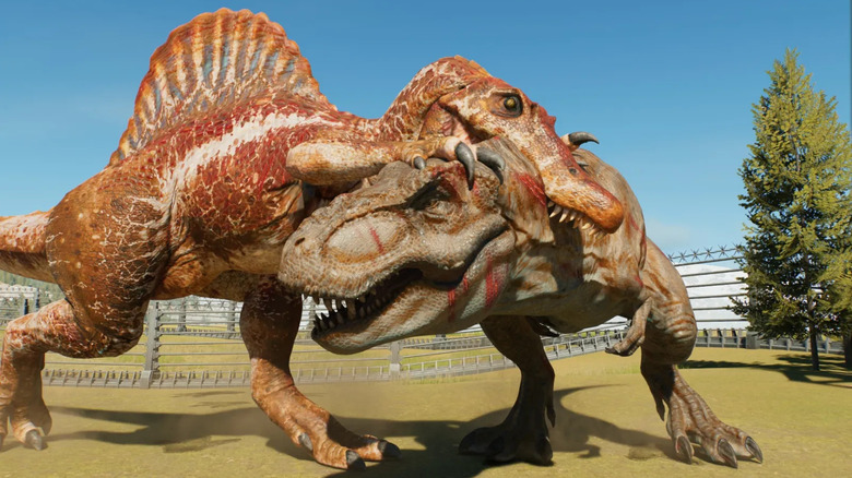 A Spinosaur bites a T-Rex in Jurassic World Evolution 3