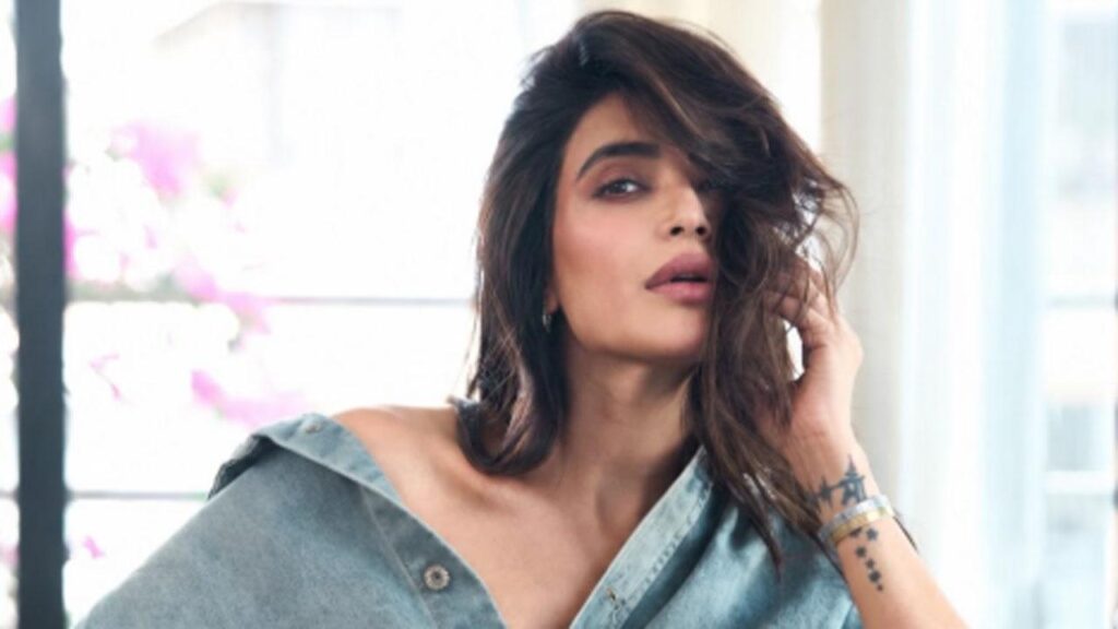 Karishma Tanna playfully calls out paparazzi for focusing on her baby bump