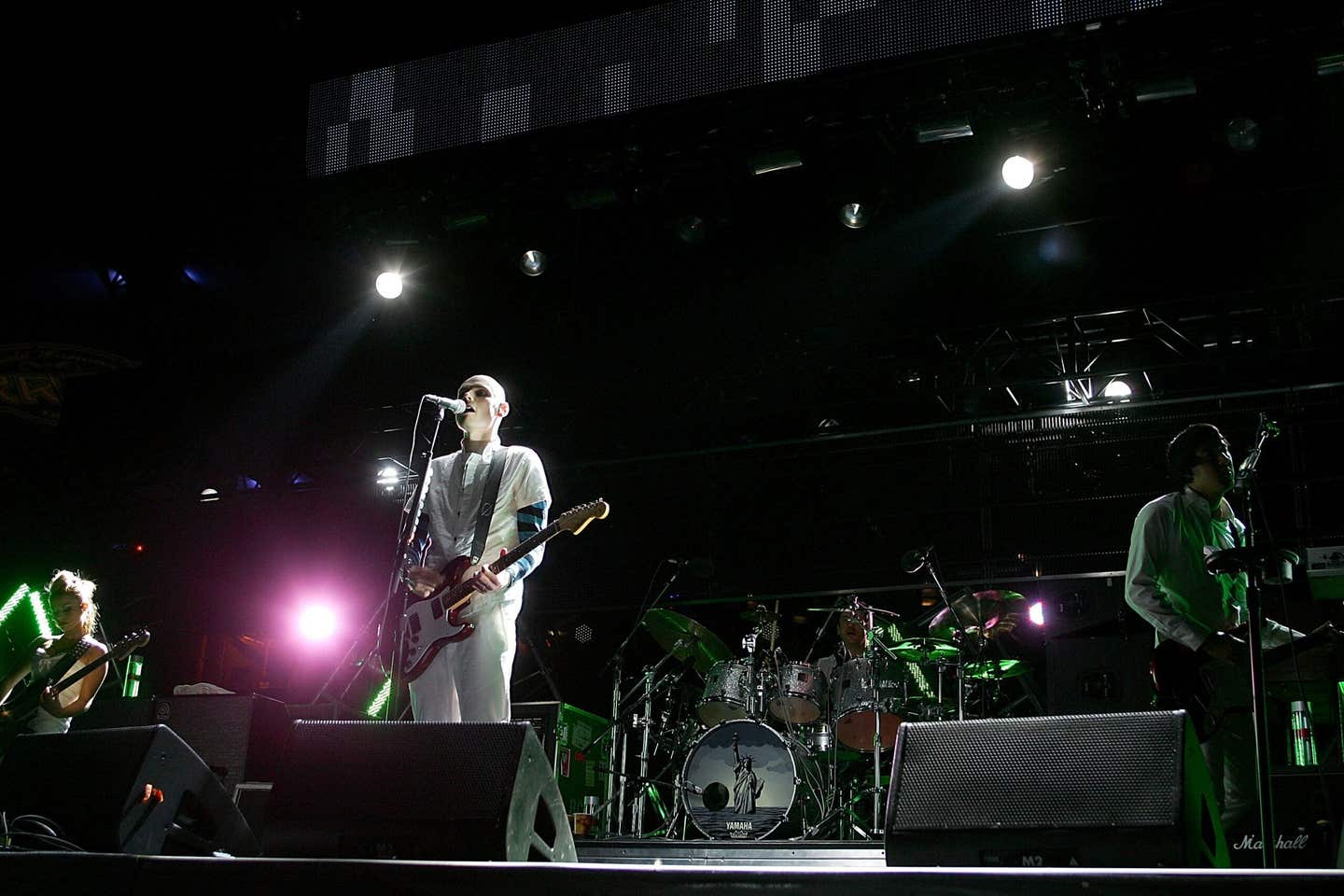 inger Reyes, Billy Corgan, Jimmy Chamberlin and Jeff Schroeder of The Smashing Pumpkins performs onstage