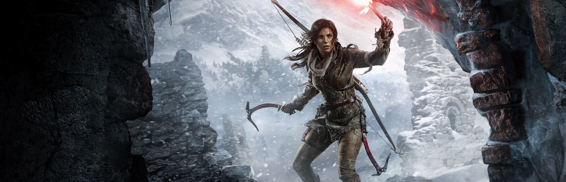 Lara Croft traversing a snowy mountainside in Rise of the Tomb Raider