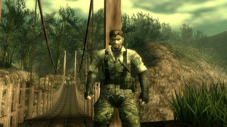 Naked Nake stands by a bridge in Metal Gear Solid 3: Snake Eater