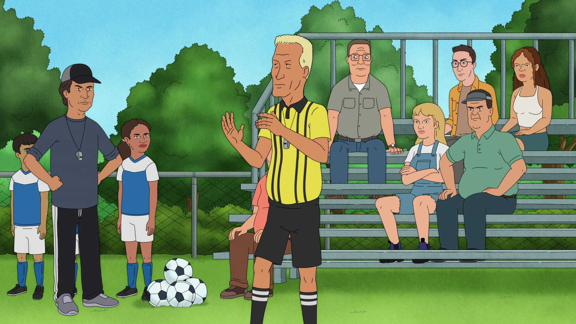 Hank watches a soccer game in Season 14, Episode 5, titled "New Ref in Town"