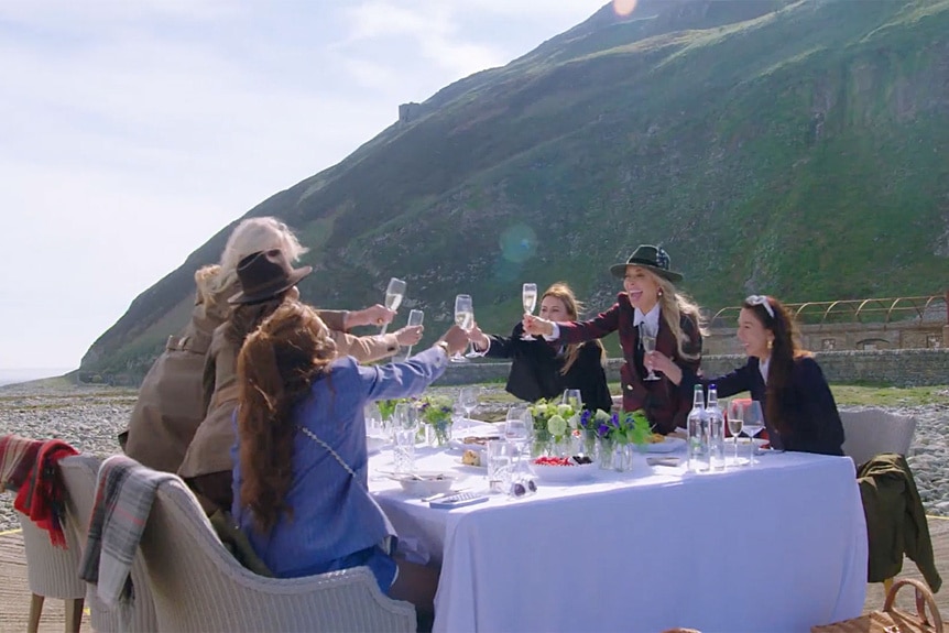 The cast toasting during The Real Housewives of London Season 1.