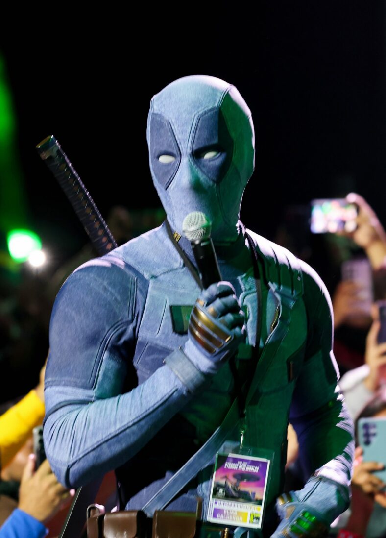 Ryan Reynolds wears a denim Deadpool costume at Comic-Con