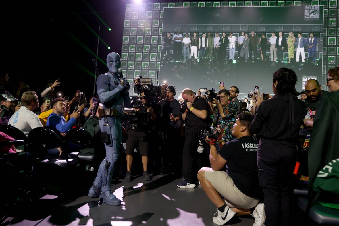 Ryan Reynolds wears a denim Deadpool costume at Comic-Con