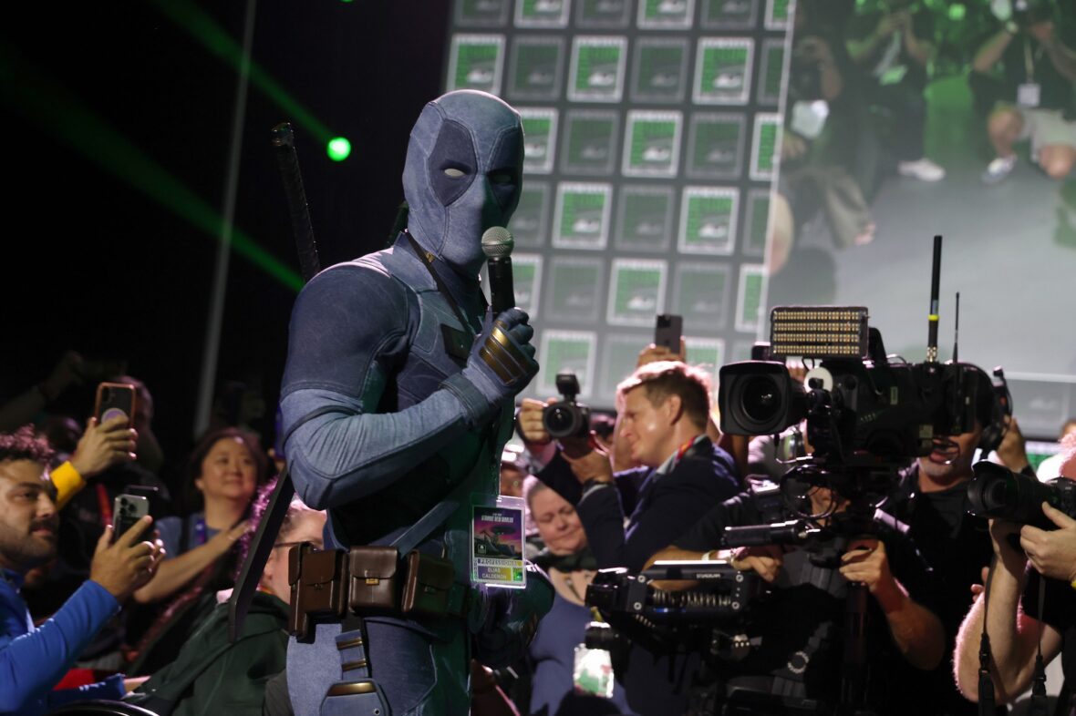Ryan Reynolds wears a denim Deadpool costume at Comic-Con