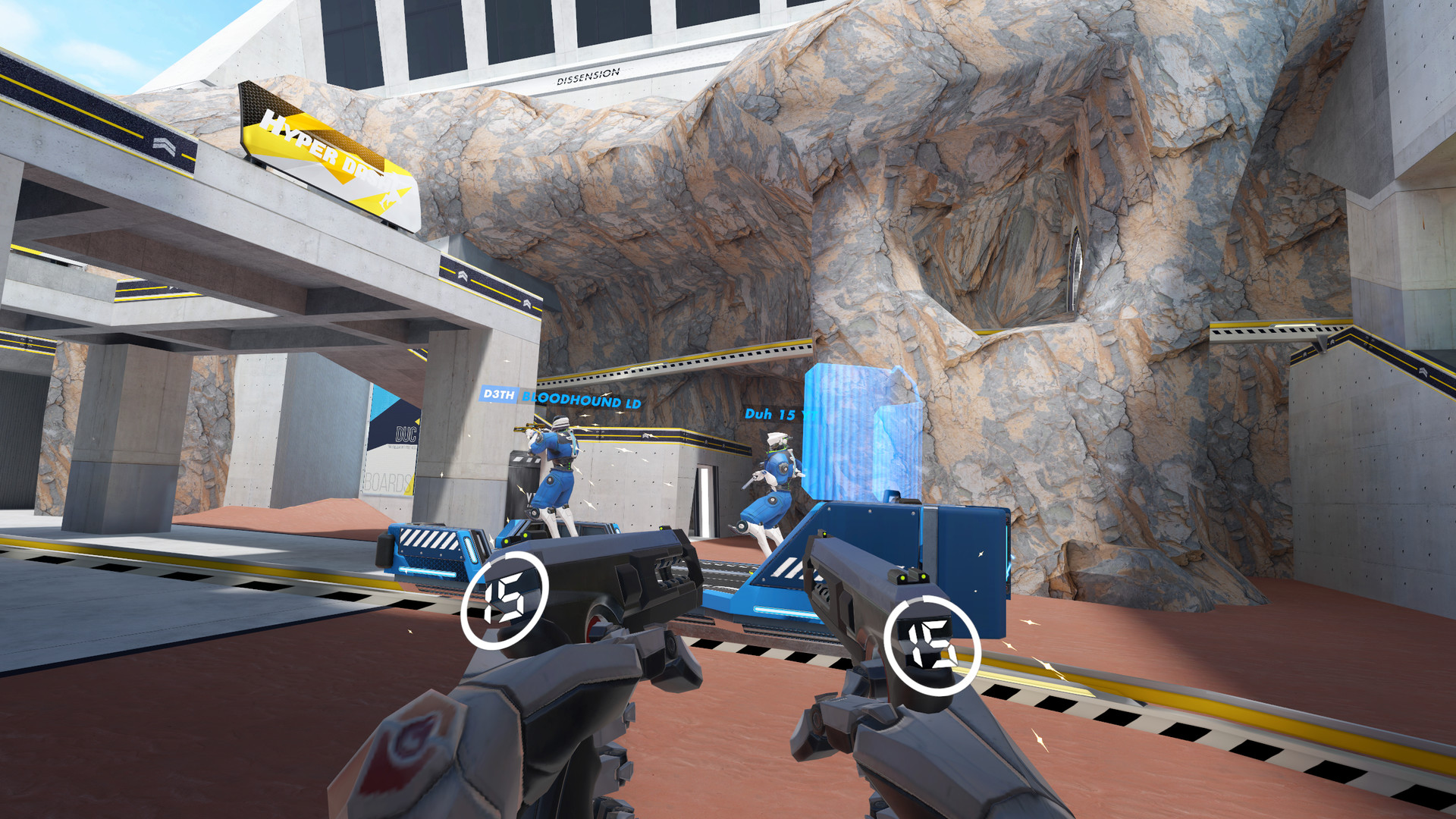 First person view in Hyper Dash holding two pistols while blue team players defend a control point beside a rock face