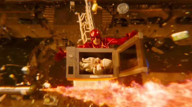 The Flash catching a baby in a microwave in The Flash