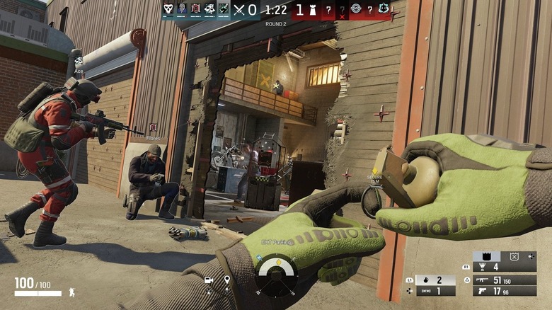 The player about to pull the pin from a grenade in Tom Clancy's Rainbow Six Siege