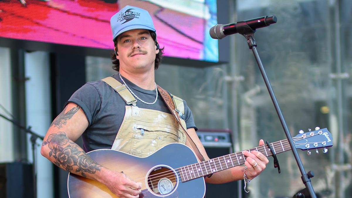 Zach John King performs onstage at Truist Park.