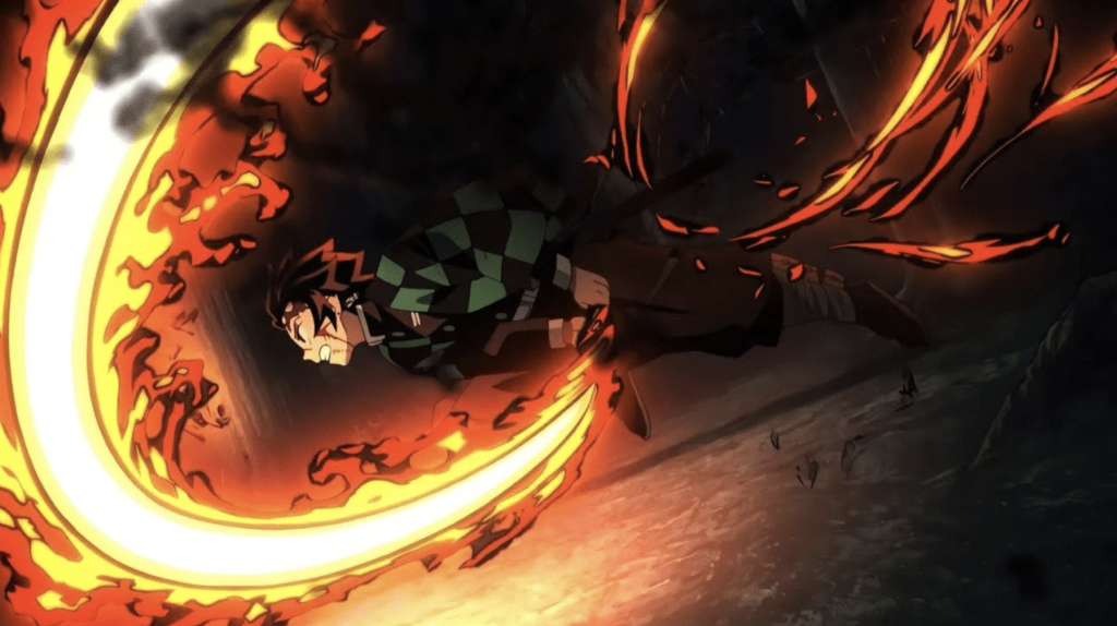 This image features Tanjiro Kamado from the anime series Demon Slayer: Kimetsu no Yaiba. In this scene, Tanjiro is shown performing the Hinokami Kagura (Sun Breathing) technique, which is characterized by intense fiery visual effects.