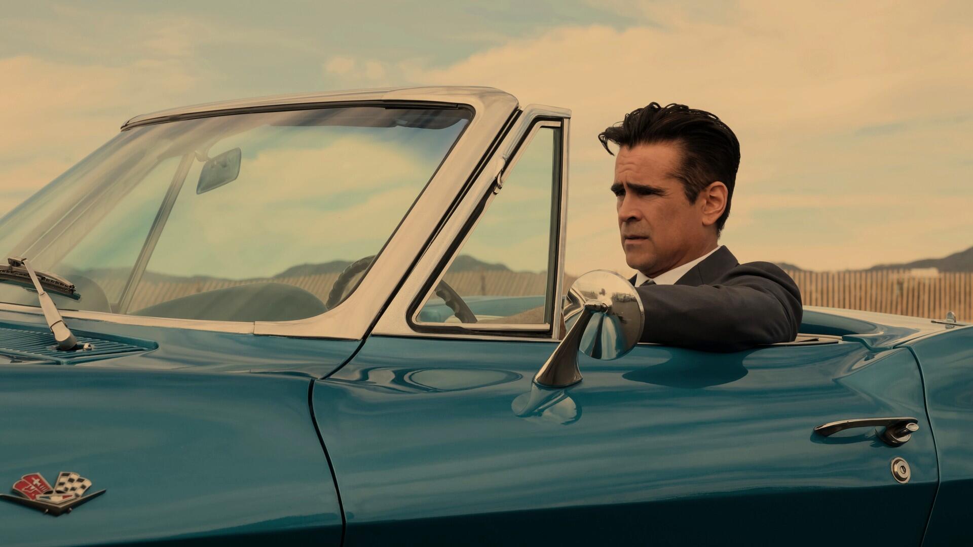 Colin Farrell in a suit and classic car in season 1 of sci-fi series Sugar on Apple TV.