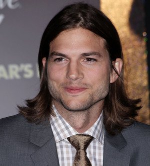 Ashton Kutcher 'just friends' with holiday companion