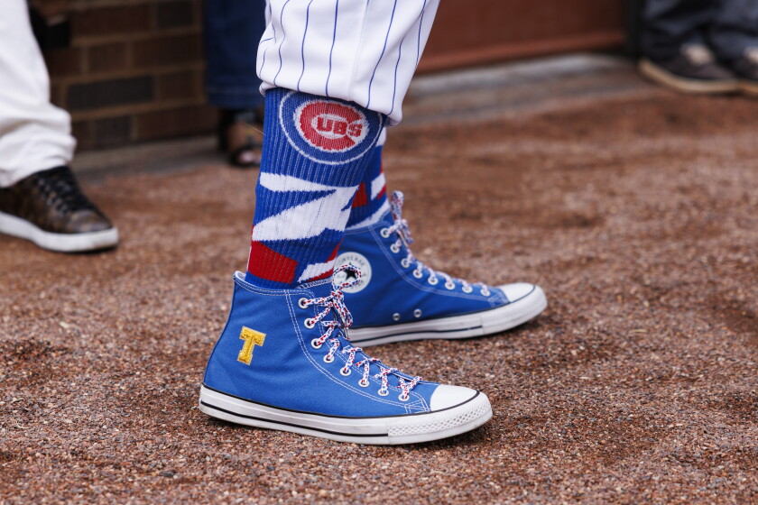 Mr. T dons special Converse shoes with an embroidered T.