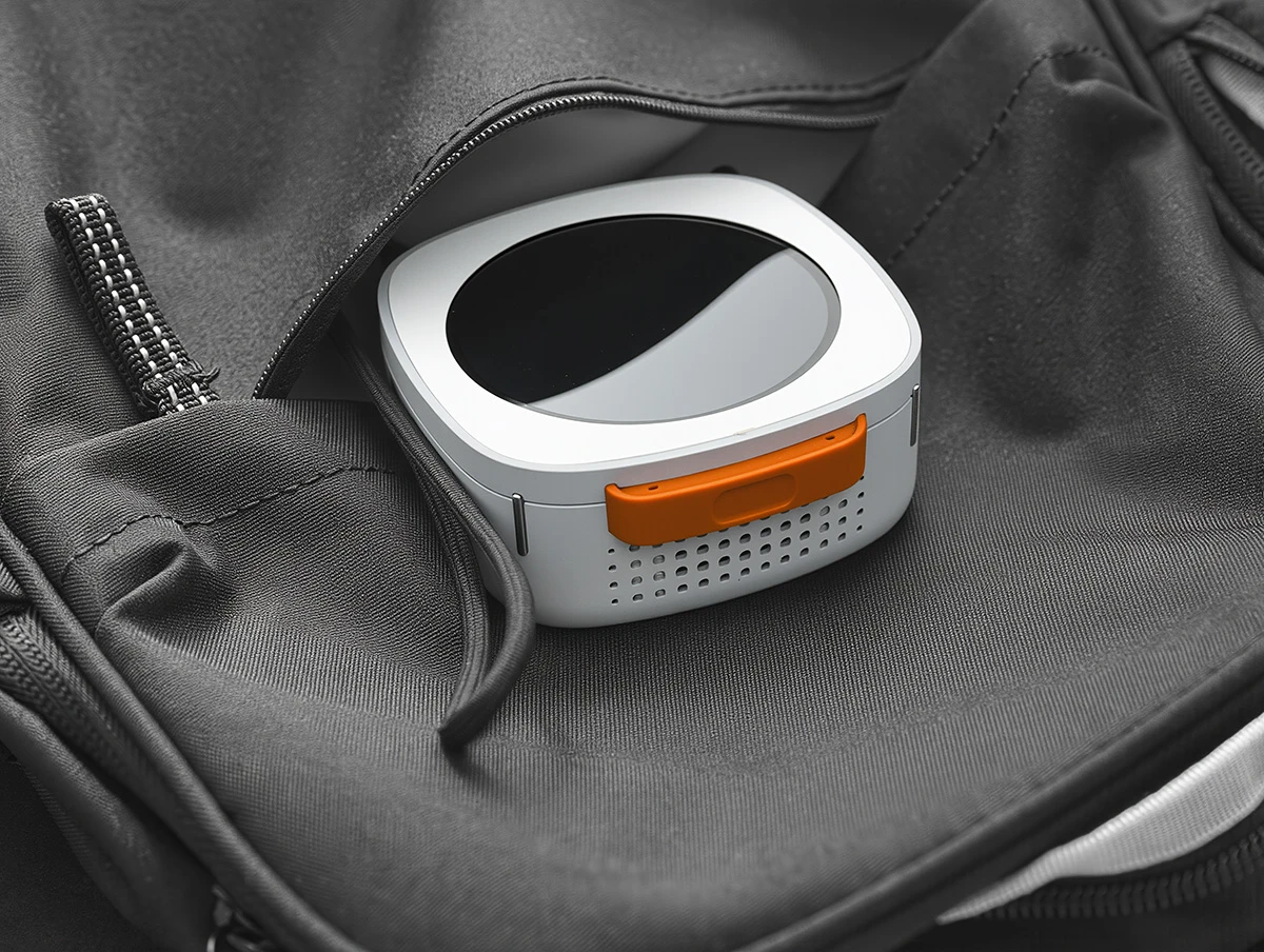 The Piston V stands less than 6 inches tall, and its 'handle' has a power button built in