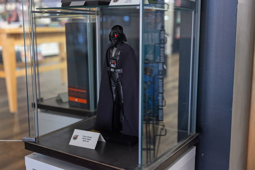 A Darth Vader figurine is on display. Foot-tall action figures were tariffed at 145% one point.