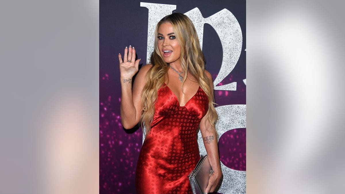 Carmen Electra arrives at the world premiere of Infinite Icon: A Visual Memoir.