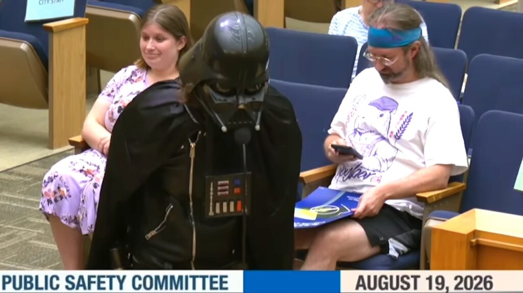 Cosplayer Dressed as Darth Vader Satirically Defends the Use of Flock Cameras in San Diego Cosplayer Dressed as Darth Vader Satirically Defends the Use of Flock Cameras in San Diego