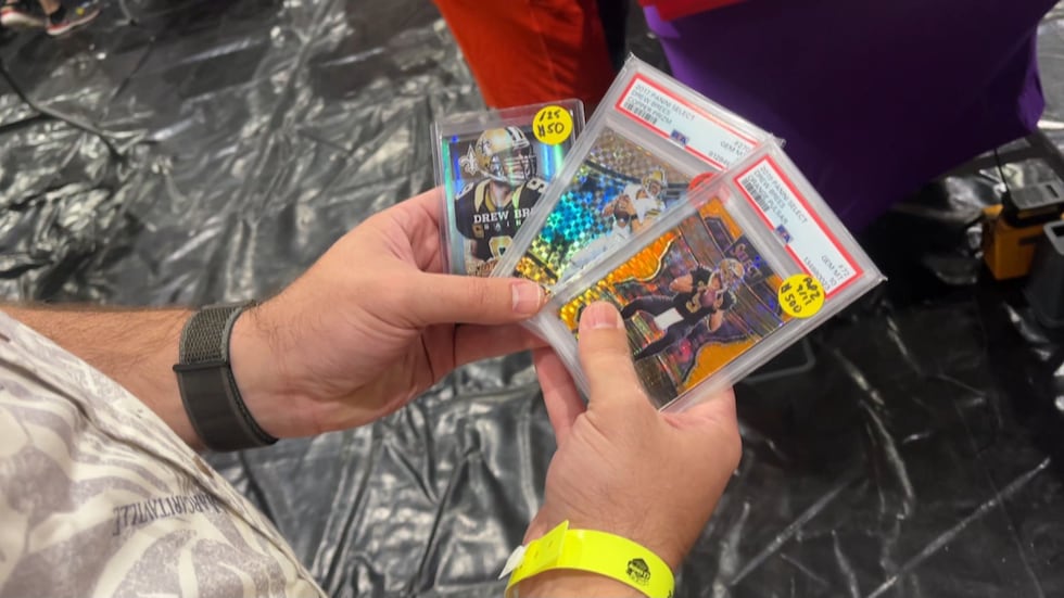 Mandeville resident Hayden Songy showed off a prize collection of his own, anchored by cards...