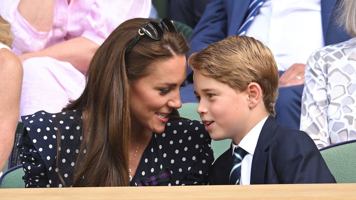 Catherine, Duchess of Cambridge and Prince George attend a tennis match.
