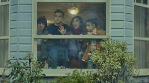 “Cheapest Rent In L.A.”: Watch the Man Living Inside a Billboard to Promote Netflix’s New Sci-Fi Film