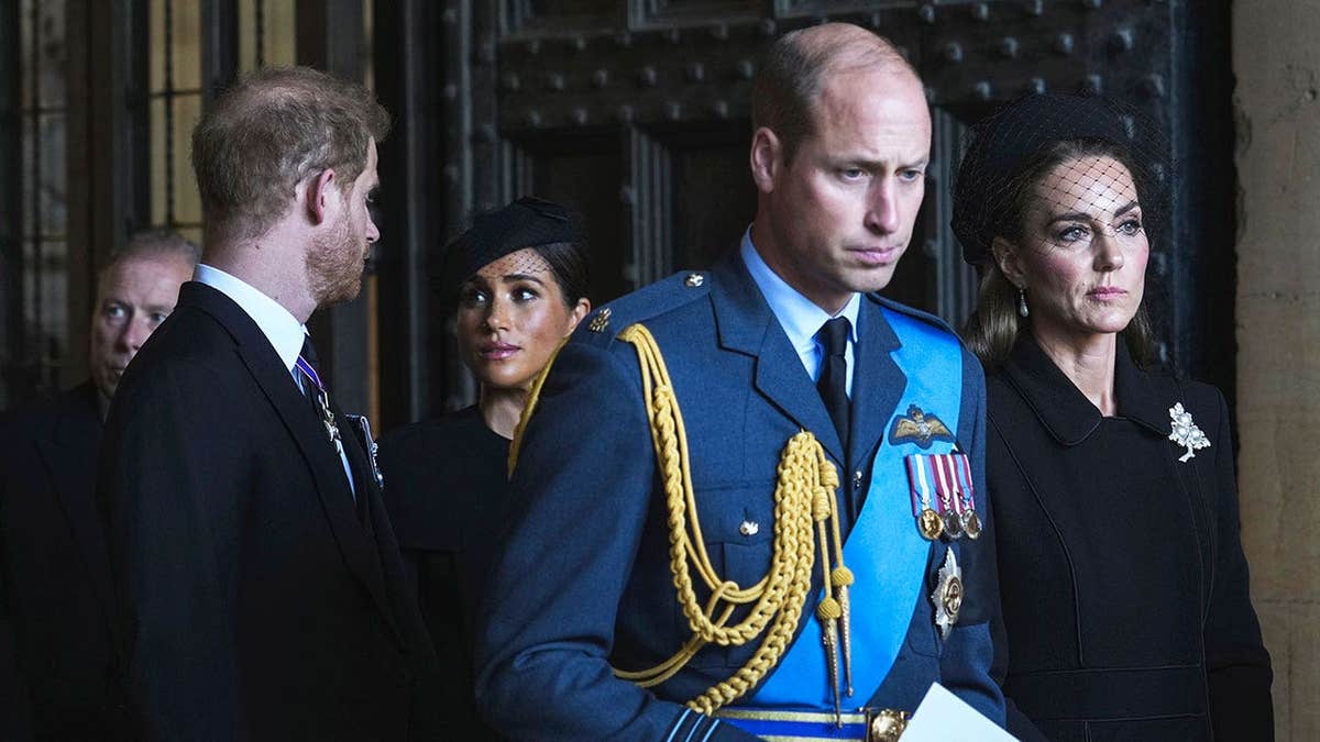 The Prince and Princess of Wales and the Duke and Duchess of Sussex looking serious at Queen Elizabeth II's funeral.
