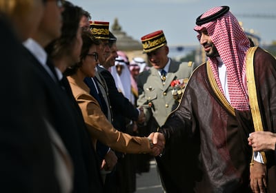 Saudi Arabia's Crown Prince Mohammed bin Salman shakes hands with Rachida Dati, mayor of the 7th district of Paris. EPA