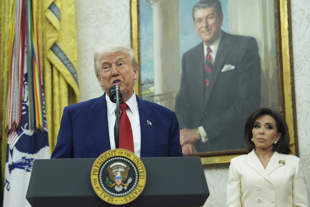 President Donald Trump, speaks during a swearing in ceremony for interim U.S. Attorney General for the District of Columbia Jeanine Pirro, right, in the Oval Office of the White House, Wednesday, May 28, 2025, in Washington.