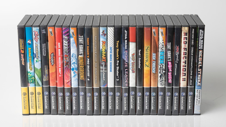 An organized collection of GameCube games in boxes