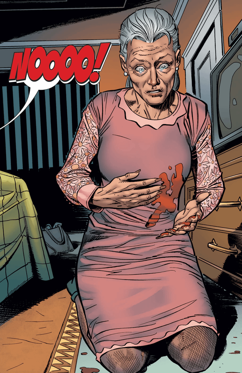 Aunt May kneeling on the ground with a gunshot wound at her side as Peter Parker screams.