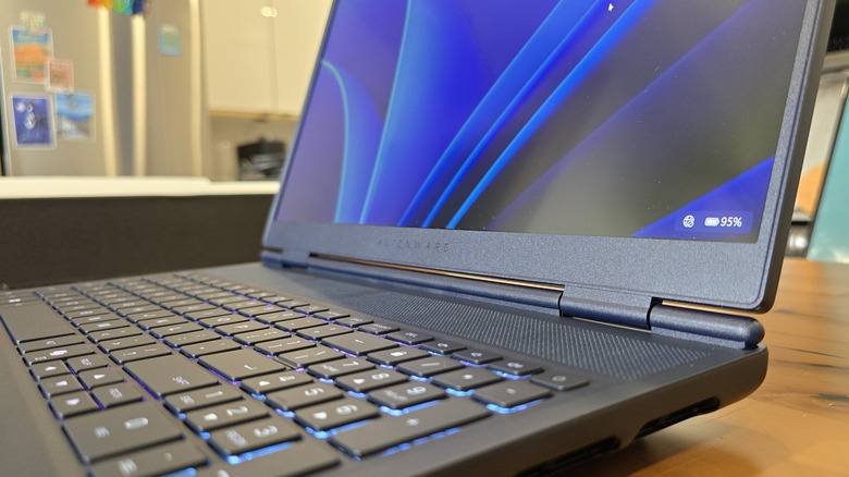 Alienware 16X Aurora laptop open showing battery percentage