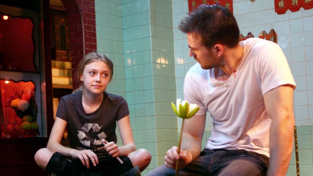 Dakota Fanning and Chris Evans in Push (2009)