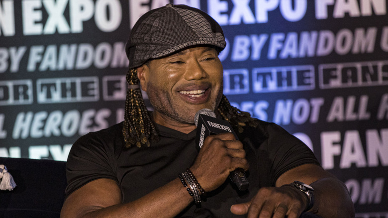 Christopher Judge smiling while talking on a Fan Expo panel