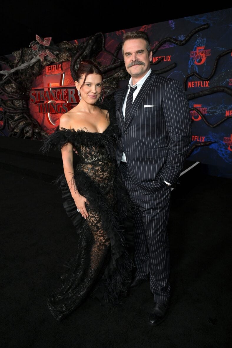 Millie Bobby Brown and David Harbour pose together at Stranger Things' final season premiere