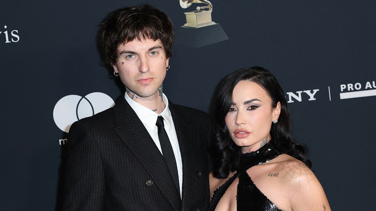 Demi Lovato and Jordan Jutes attend the Recording Academy pre-Grammy gala at the Beverly Hilton hotel.