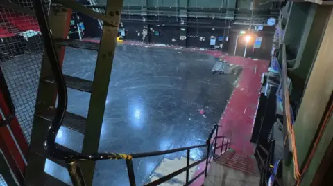The Elstree Project A high view looking down on a studio from the top of some stairs.