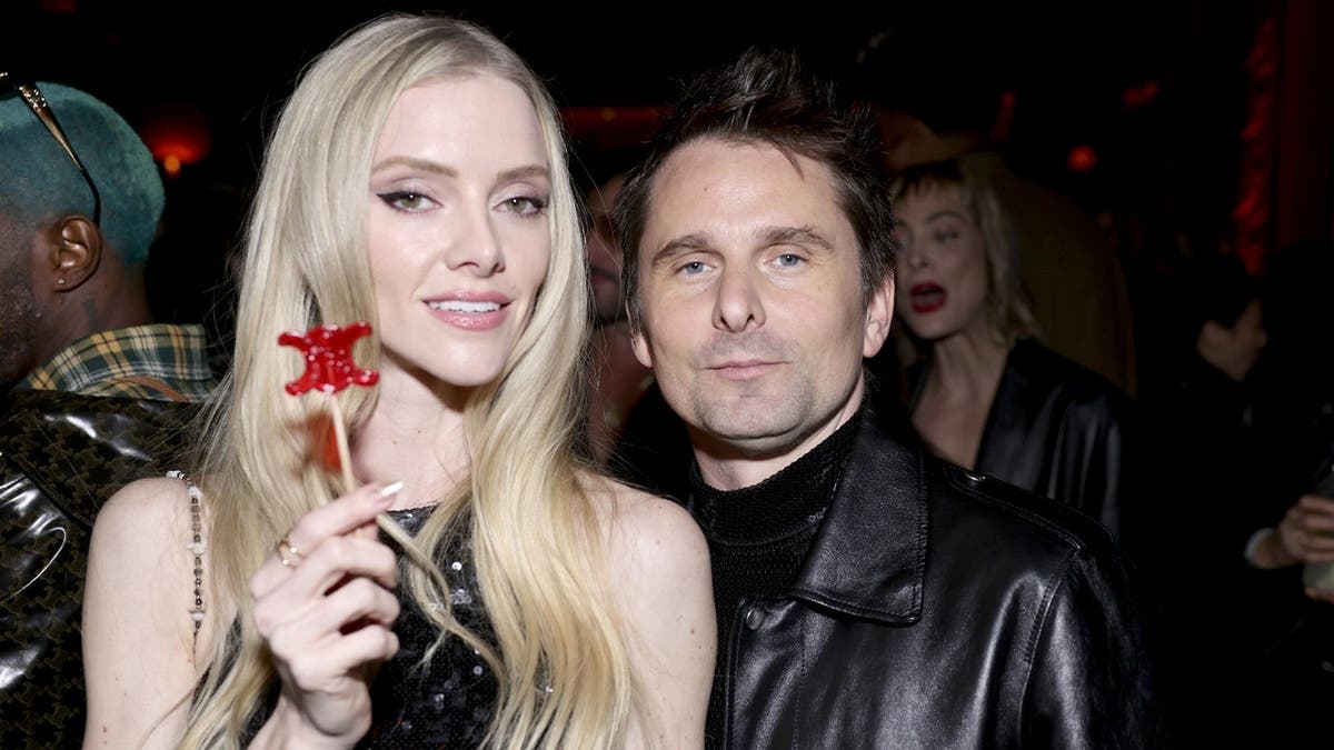 Elle Evans and Matt Bellamy attend Celine at The Wiltern in Los Angeles.
