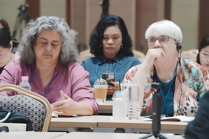 Vicki Ronn, right, an English professor at Friends University in the United States, listens to a presentation during the 5th International BTS Conference at Jeonbuk National University Convention Center, Sunday. Courtesy of The 5th BTS: A Global Interdisciplinary Conference