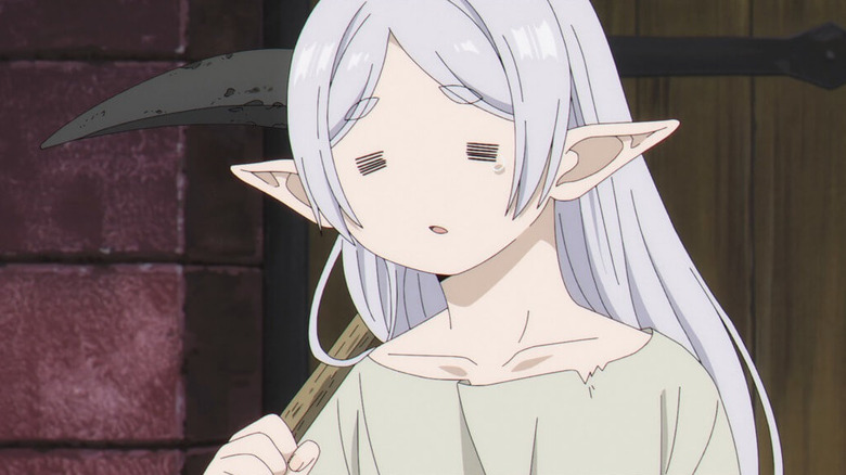 Frieren, with a tired expression, carries a pickaxe in Frieren: Beyond Journey's End