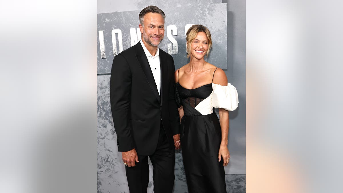 Jill Wagner and her husband David posing together