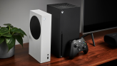 Xbox Series S and Series X on a TV stand
