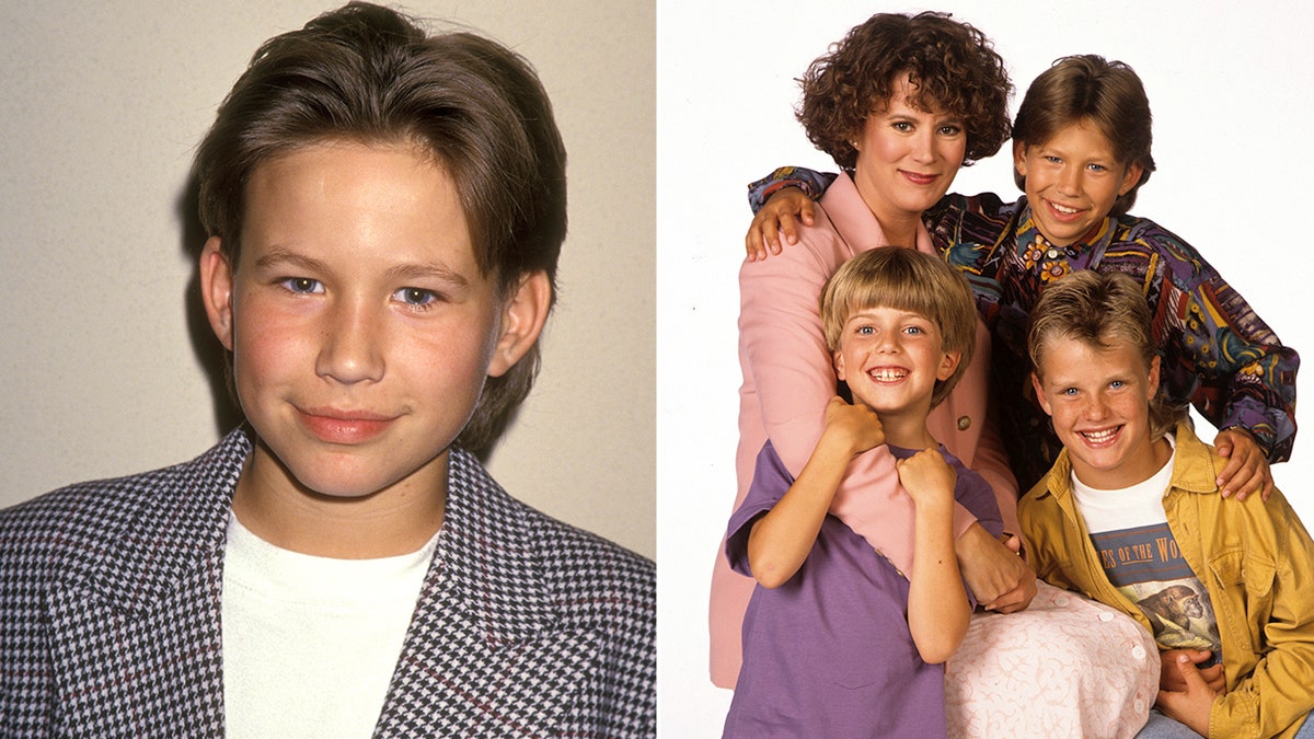 Jonathan Taylor Thomas stands with the Home Improvement cast in a posed promotional portrait.