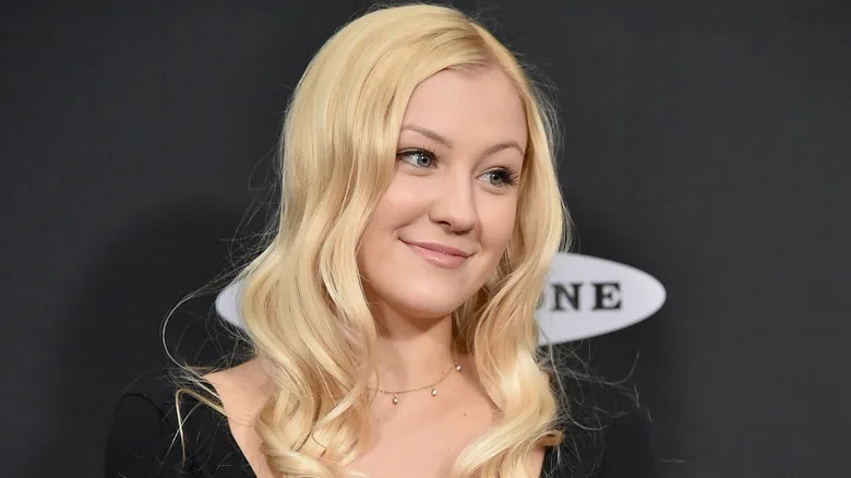 Ava Sambora smiles on the red carpet in 2018