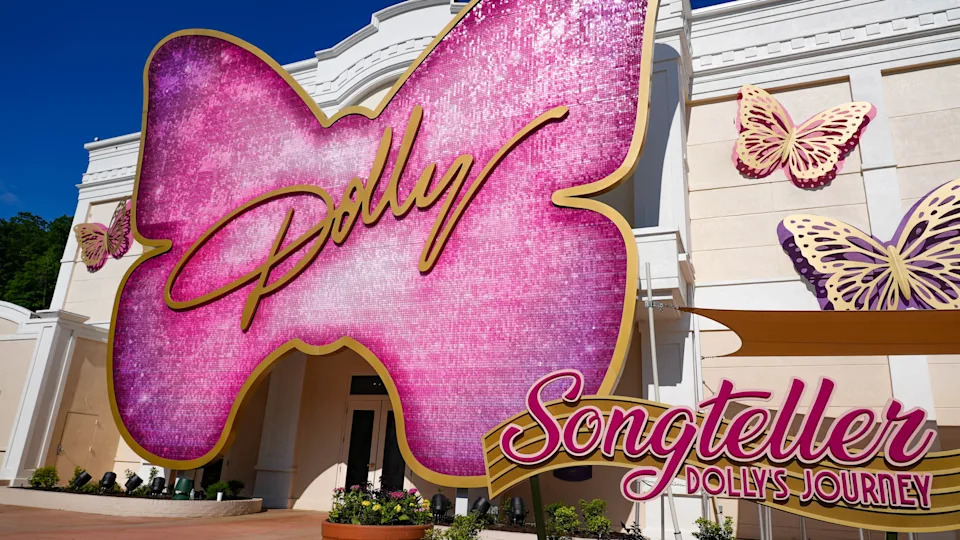 A gleaming pink butterfly greets guests outside of "Songteller," part of The Dolly Parton Experience, an all-new attraction at Dollywood theme park.