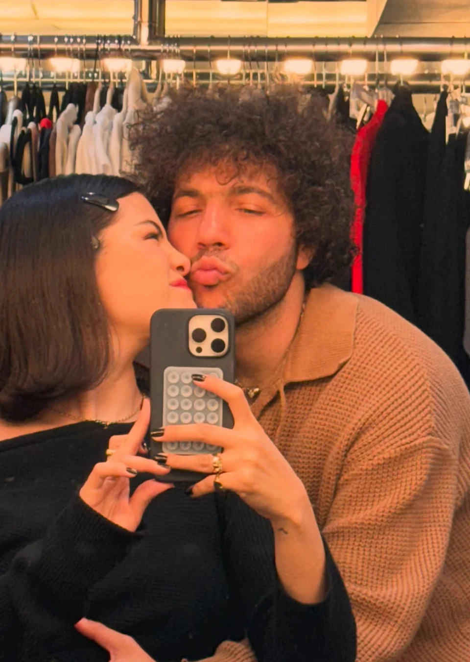 Selena Gomez and Benny taking a mirror selfie